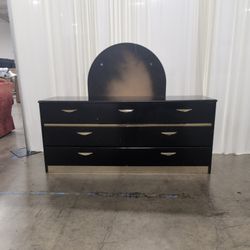 Black Seven-Drawer Dresser with Arched Mirror