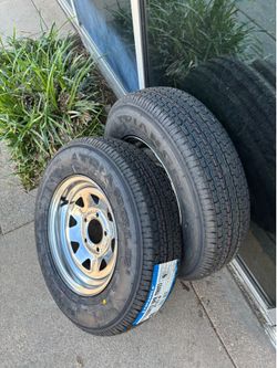 2 trailer tires 175x80-13 with chrome rim $200 for 2