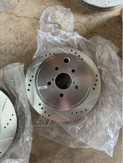 Drilled and Slotted Rotors with brake pads