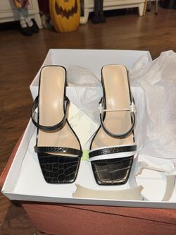 $15-The Drop Avery Square-Toe Two-Strap High Heeled Sandal in a black and white finis