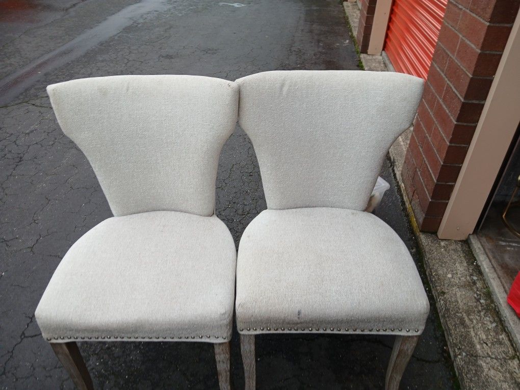 Two White Fabric Chairs