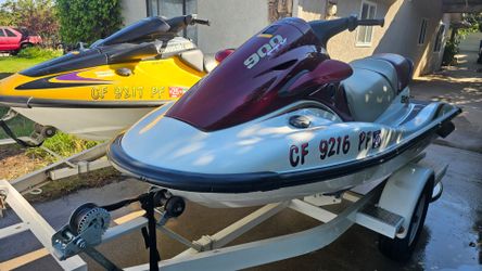 two jetskis with trailer for sale please read description