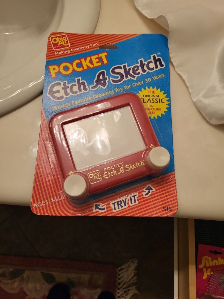 Etch A Sketch Pocket Size cardboard box.Never been open perfect you're made\nNineteen ninety two