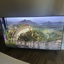 60 Inch TCL smart Tv (cracked on top left)