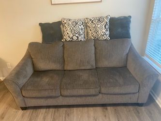Gray Fabric Sofa with Accent Pillows –