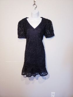 black dress and pink accessories Kiyonna Plus Size Lavish Lace Wrap Dress main image 1