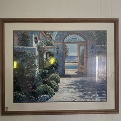 Wall art framed under glass