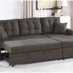 CONVERTIBLE SECSIONAL.    WHIT PULL OUT BED  REVERSIBLE L/ R CHAISE.   WHIT.  STORAGE.  ASH BLACK 