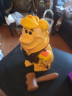 Barney, rubble in bam bam with the bat