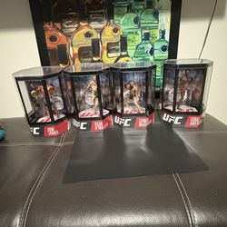 Unopened UFC figure lot