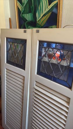 Stained glass window shutters.