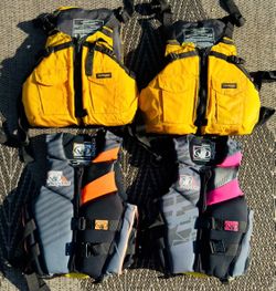 Family water safety pack!  Set of 4 High-Quality Life Jackets (Stohlquist & Body Glove Phantom)