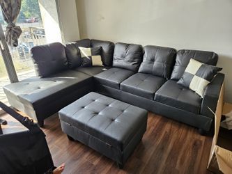 LIMITED TIME SPECIAL New box black faux leather sectional with pillows storage ottoman