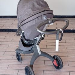 Stokke Xplory stroller bundle-type setup (seat + bassinet)