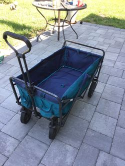 Mac Sports Collapsible Folding Outdoor Utility Wagon, Teal. No issues with wheels in perfect working condition.