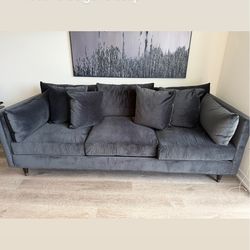 Black velvet couch with matching chair