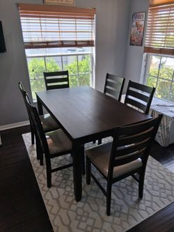 Ashley Rokane Dining Table and 6 Chairs D397-425
