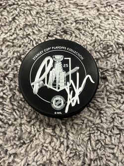 Stanley Cup Autographed Puck By Paul Marucie & Kris Knoblauch