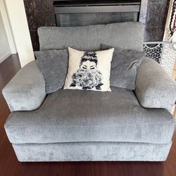 Ashley furniture .. Grey couch with grey oversized chair