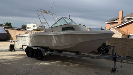 21' Wellcraft Airslot with 2004 Trailright trailer
