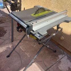 RYOBI 10 INCH TABLE SAW WITH STAND 