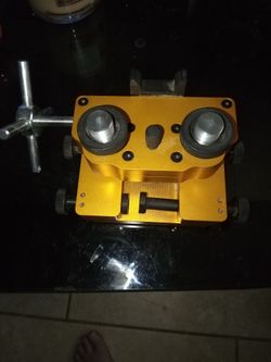 Gun sight adjuster