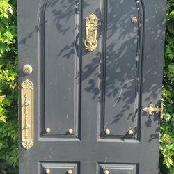 Exterior fiberglass medieval door hurricane impact stickers have been removed or painted over 36x79