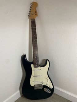 Squier by Fender Electric Guitar Bullet Strat Black And White