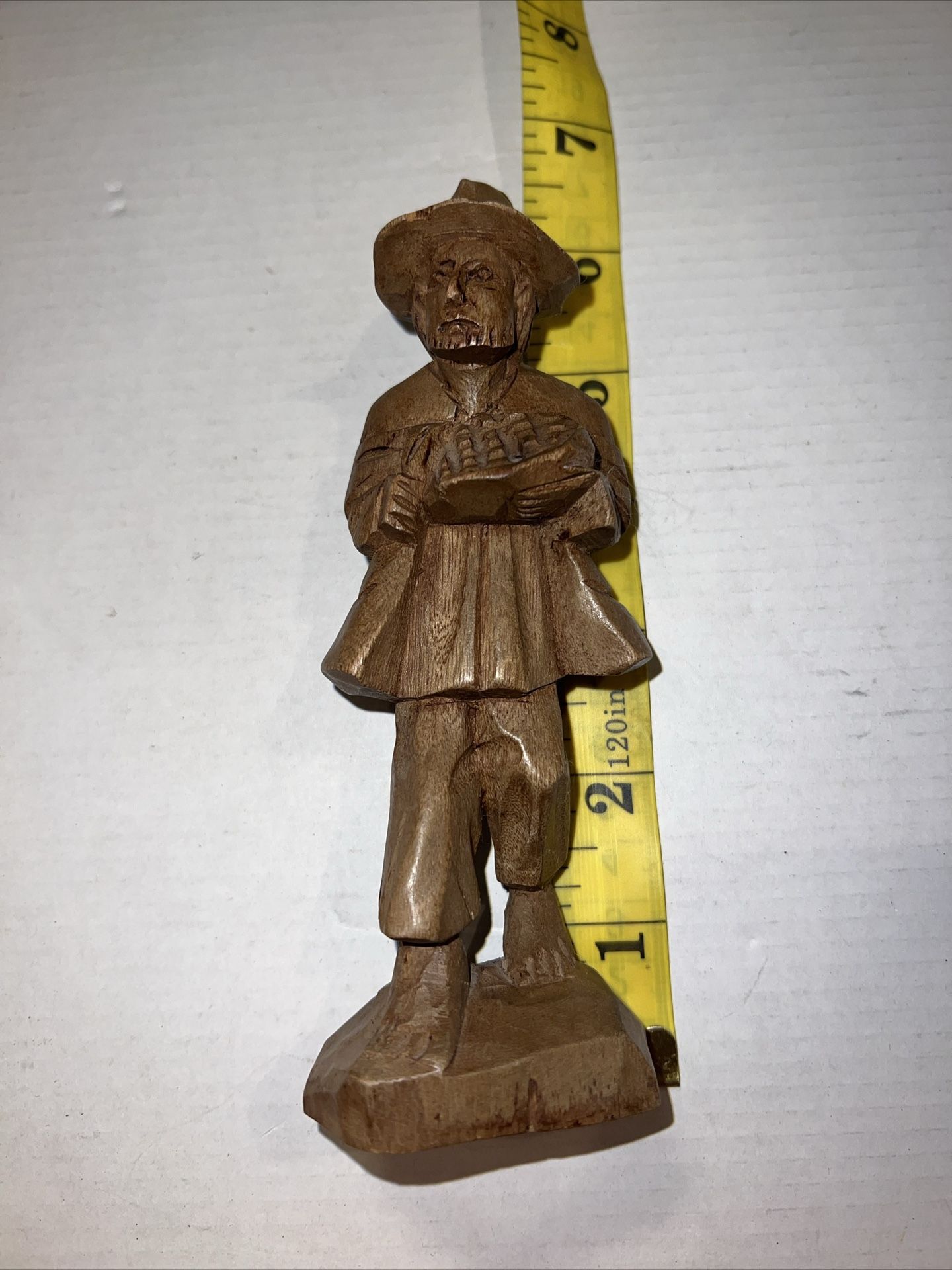 Hand Carved Wood Figurine Of Barefoot Man Holding Bowl