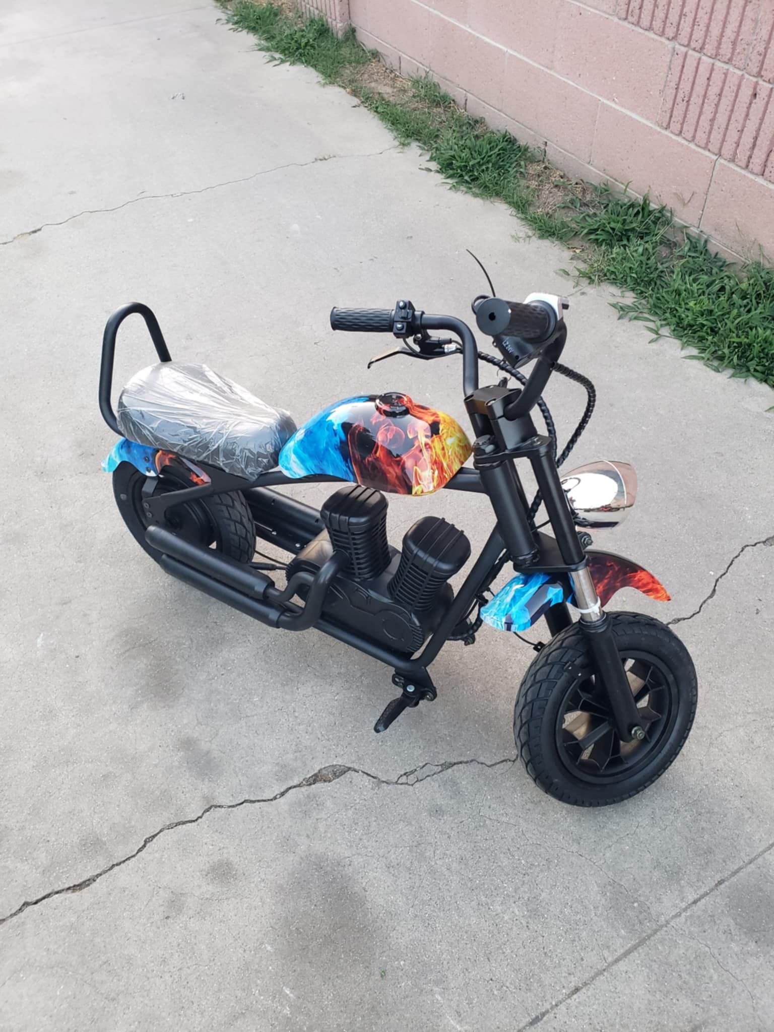 Electric chopper Bike For Kids Under 14 to 6 Years old. Is brand new in box or built $325! The lowest. Is brand new not Beat or abused. Electric scoot