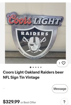 Raiders metal sign