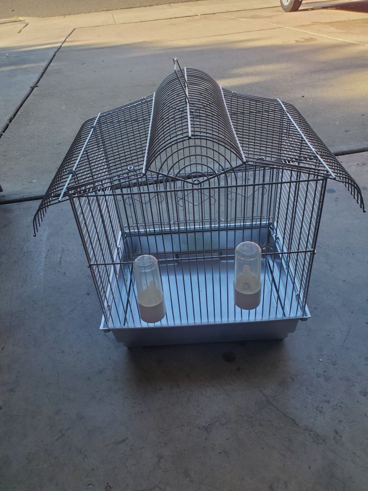 Bird cage & 2 water bottles