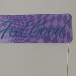 “Feel Good” neon sign
