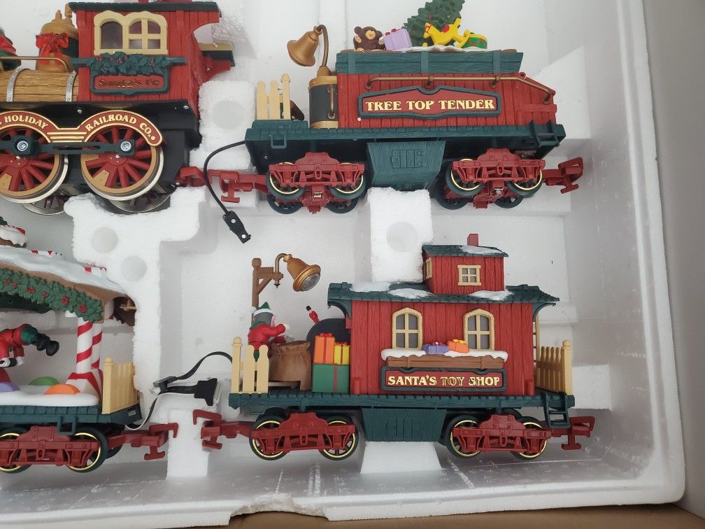 The HOLIDAY EXPRESS Animated Christmas Train Set In Box for Sale
