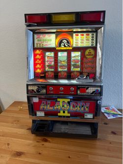 Aladdin II" Japanese pachislo / slot machine, three bar machine with three buttons to halt reels and back lit display