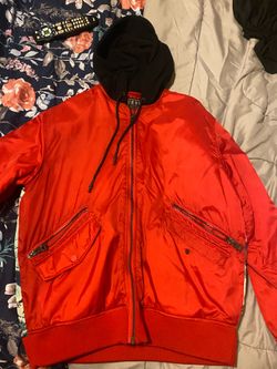 GUESS red coat with graphic in the back