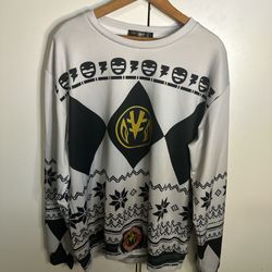 Bold crewneck sweater with striking black and white patterns. Features iconic Power Ranger symbols.