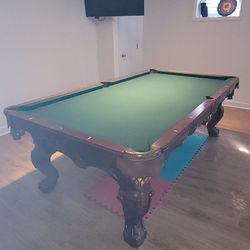 Pool Table. Winer's Choice. 8 Ft.97 Inches Long, 54 Inches Wide, 32 Inches high.This Is a slate table 