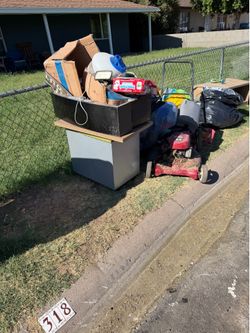 Free stuff  lawnmower, Farm sink, mini jumper kids, clothes, shoes, etc.