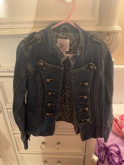 Children place jean jacket