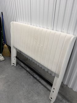 Full size bed frame with headboard.