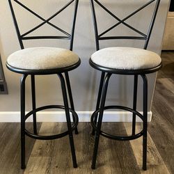 two swivel bar stools 30”H