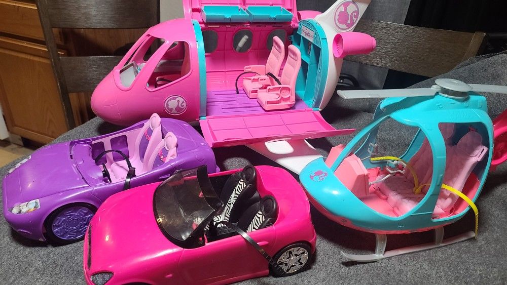 LOT OF 4 BARBIE PLANE/ HELICOPTER/ 2 CARS
