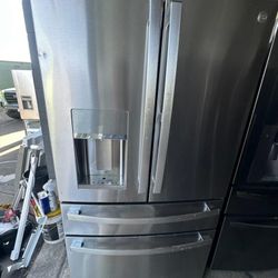 GE PROFILE STAINLESS STEEL 4 DOOR REFRIGERATOR small Dent 