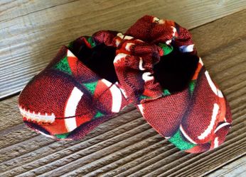 Football print baby booties