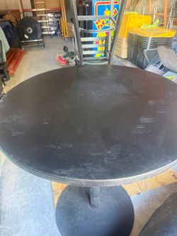 Round Black Pedestal Dining Table