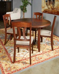 Ashley Signature Design - Charnalo Round Dining Table Set with Chairs
