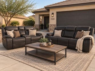 Gorgeous gray 100% leather power couch and loveseat set