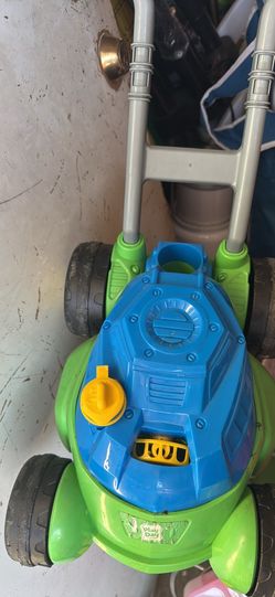 Kids bubble pushing lawnmower