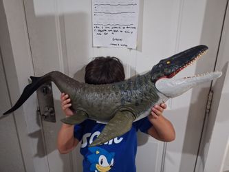 Mattel Jurassic world Rebirth Super Colossal Mosasaurus Action figure dinosaur.  Good condition.  its missing just the small left  fin.